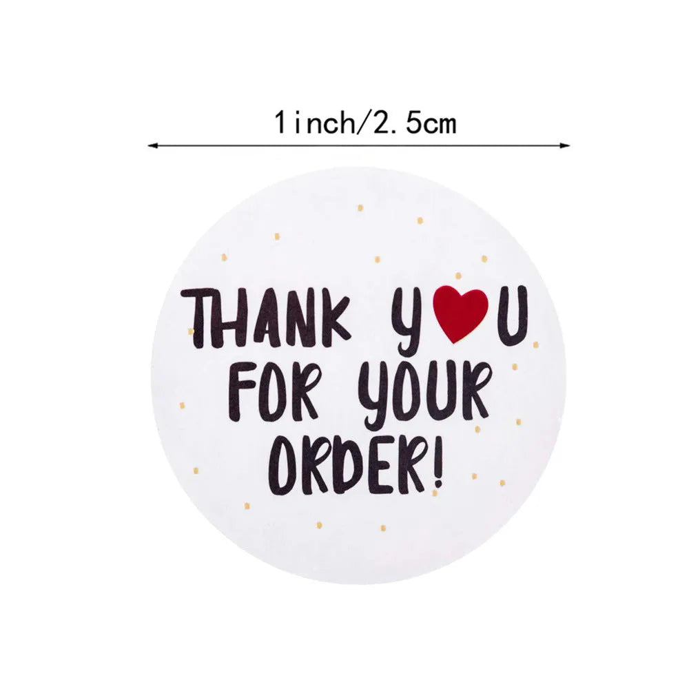 Round white thank you sticker with text on copper plate material, 2.5cm diameter, roll packaging shown