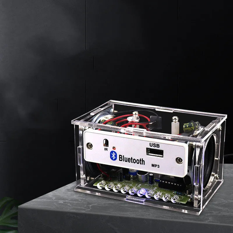 Bluetooth speaker DIY electronic assembly kit with circuit board and transparent plastic housing
