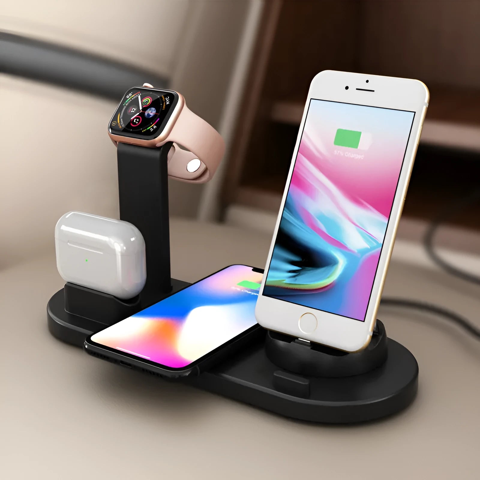 Black three-in-one wireless charging stand holding an Apple Watch, AirPods case, and iPhone