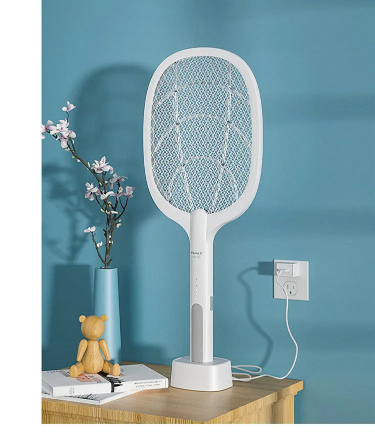 A handheld USB-rechargeable electric mosquito swatter with a black mesh paddle and a grip handle.