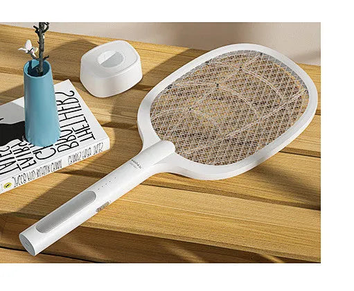 A handheld USB-rechargeable electric mosquito swatter with a black mesh paddle and a grip handle.