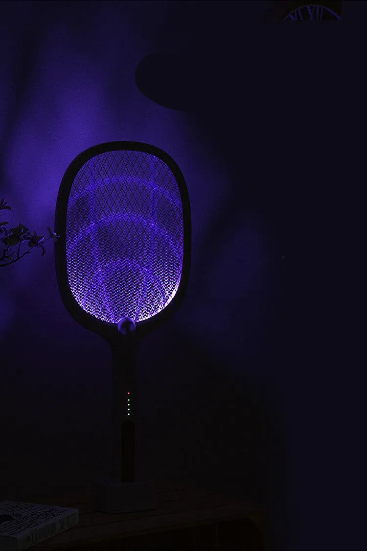 A handheld USB-rechargeable electric mosquito swatter with a black mesh paddle and a grip handle.