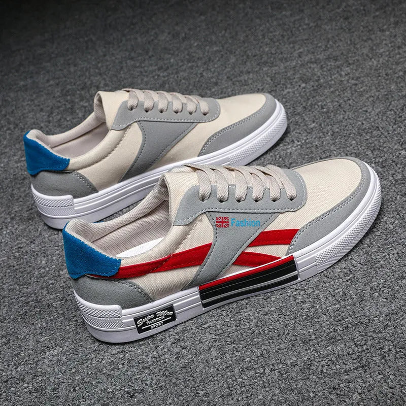 Men's canvas sneakers in black with rubber sole, round toe, and front tie lace closure.