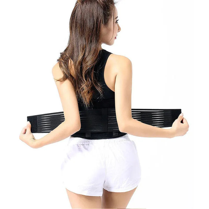 Black self-heating magnetic waist support belt laid flat, showing elastic cloth material and adjustable design.
