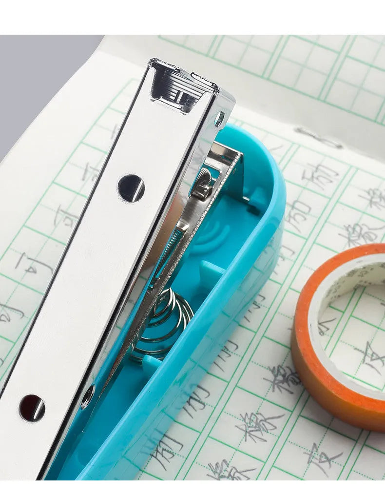 Black rotatable student stapler showing 360-degree head rotation and centre seam binding guide.