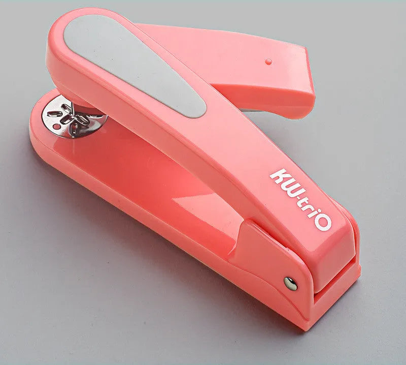 Black rotatable student stapler showing 360-degree head rotation and centre seam binding guide.