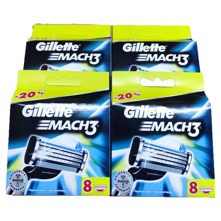 Blue Gillette manual razor and eight replacement blade cartridges on white background.
