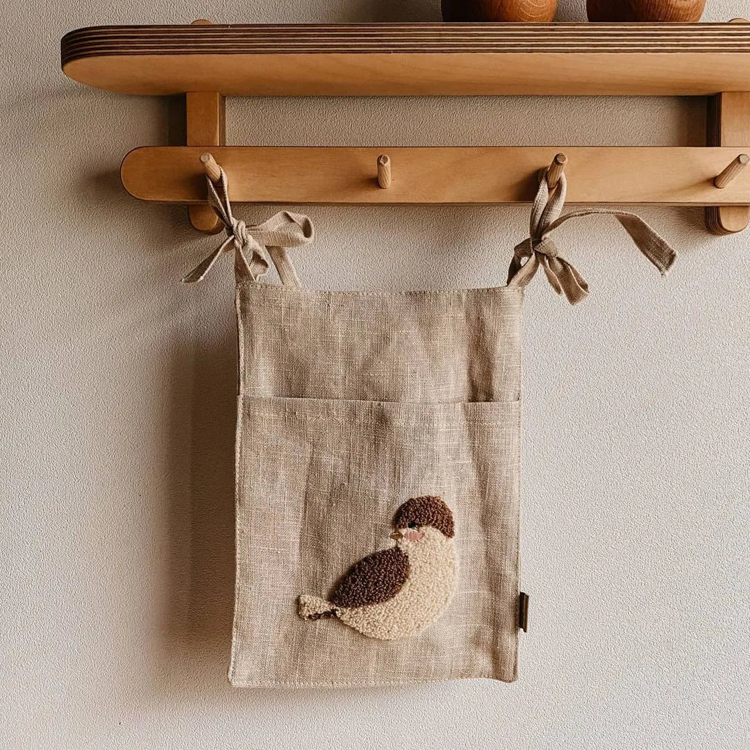 Khaki cotton linen bedside hanging storage bag with a single A pocket compartment.