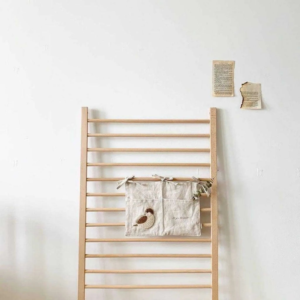 Khaki cotton linen bedside hanging storage bag with a single A pocket compartment.