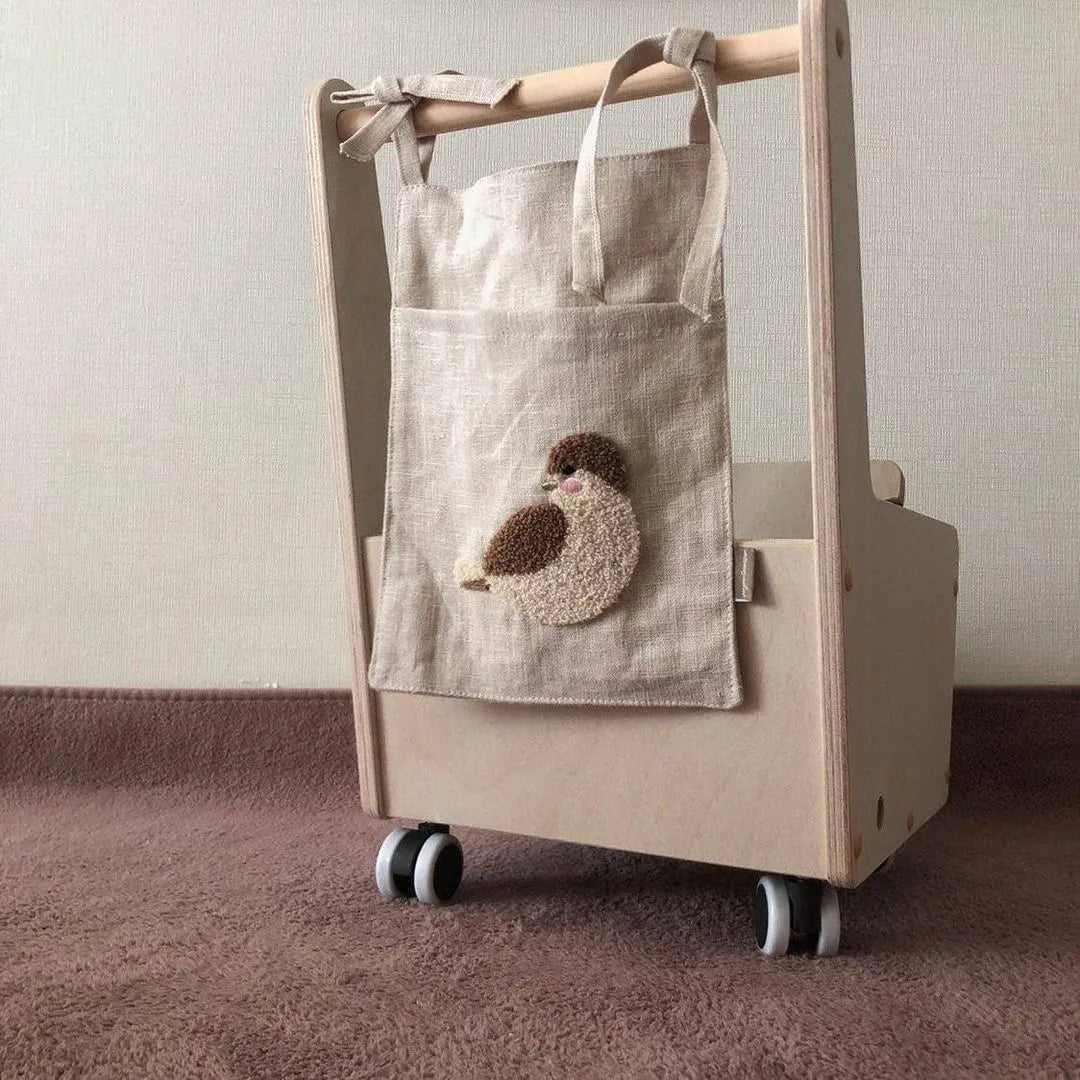 Khaki cotton linen bedside hanging storage bag with a single A pocket compartment.