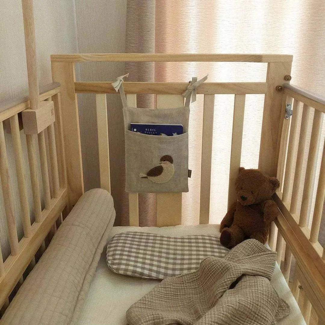 Khaki cotton linen bedside hanging storage bag with a single A pocket compartment.