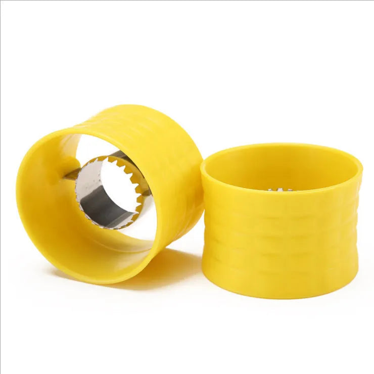Yellow manual corn thresher with corn-cob shape and textured PP grip.