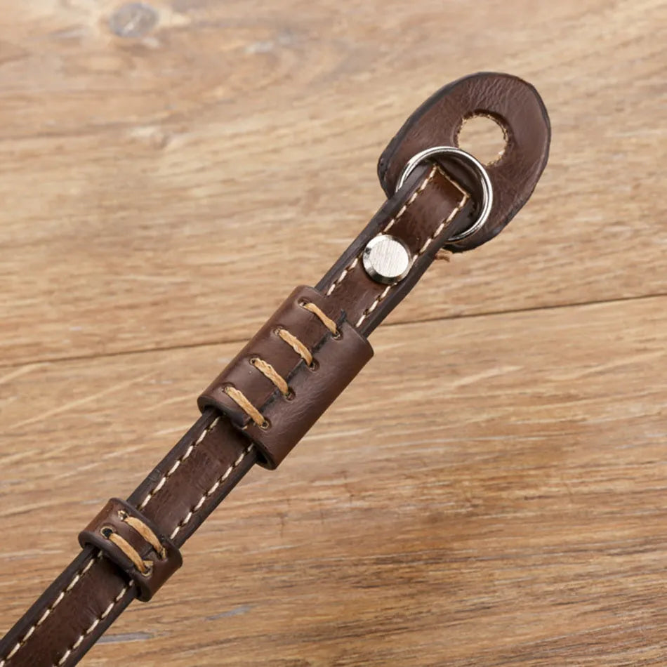 Black and brown camera wrist strap for digital cameras with small mounting holes