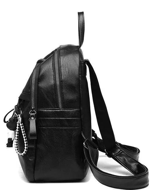 Black soft-surface PU leather backpack with double straps, shown with a capacity of 20-35 litres.