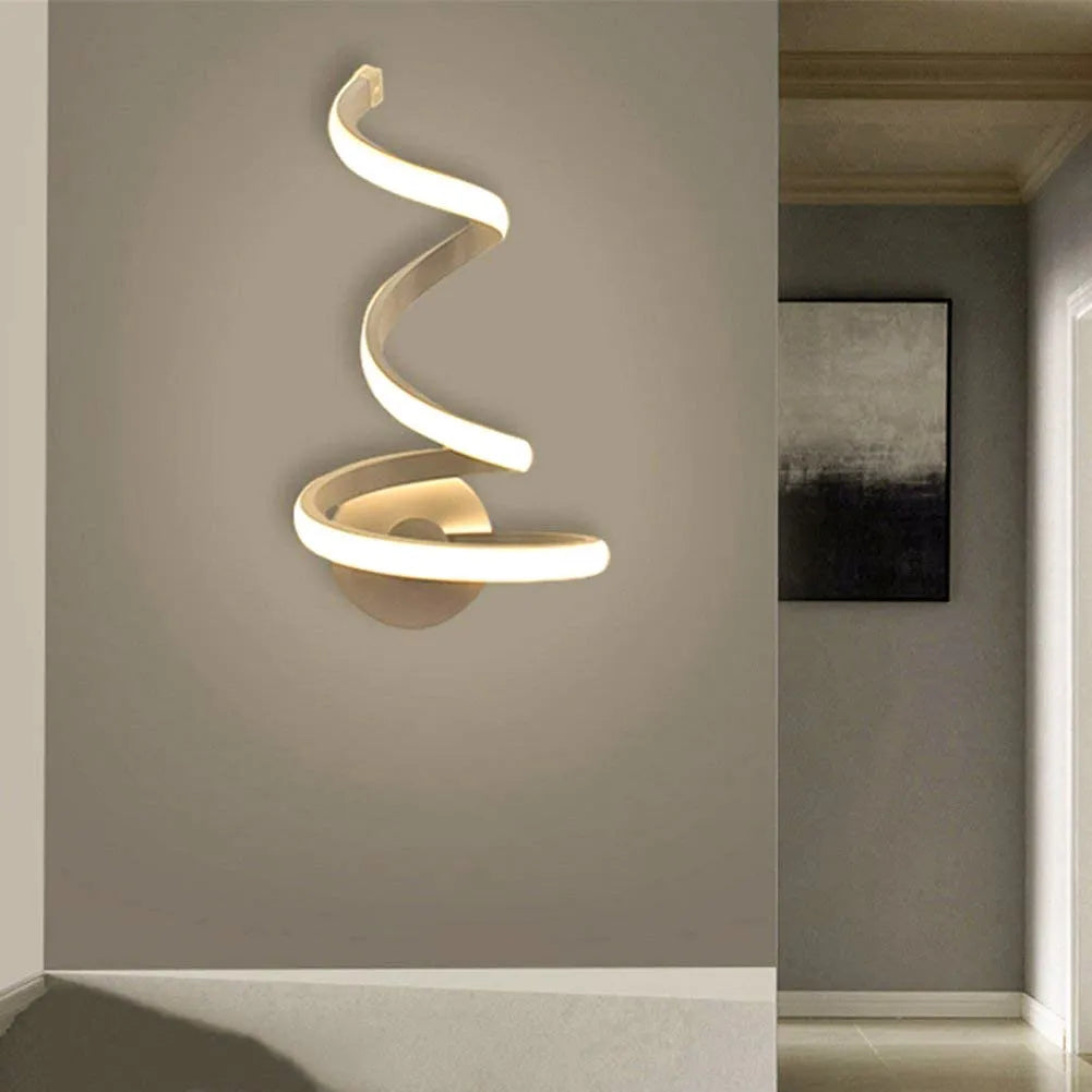 Modern brushed aluminium decorative wall lamp with optional outer snake style on a white wall.