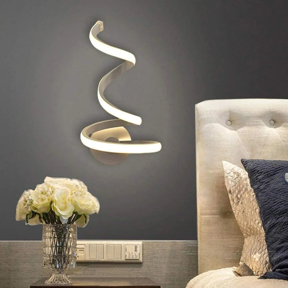 Modern brushed aluminium decorative wall lamp with optional outer snake style on a white wall.