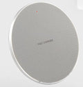 Round aluminium alloy 10W wireless phone charging pad with Qi receiver in black or grey.