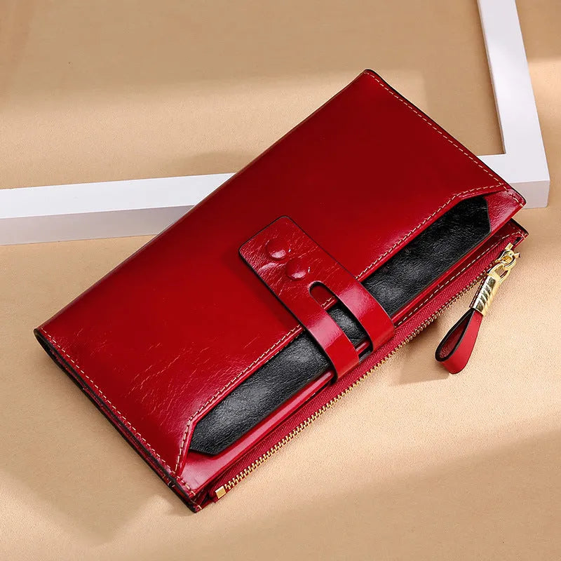 Retro style women's oil wax leather wallet showing multiple card slots, cash clip, and buckle closure in natural yellow colour