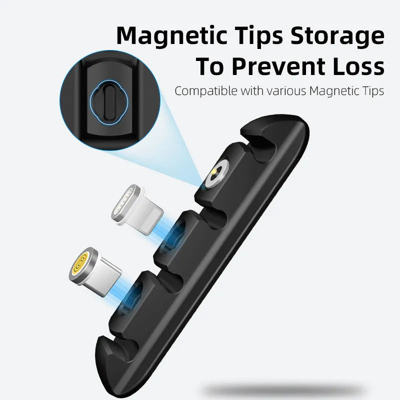 Black soft plastic desktop organiser holding magnetic charging cables on a wooden desk.