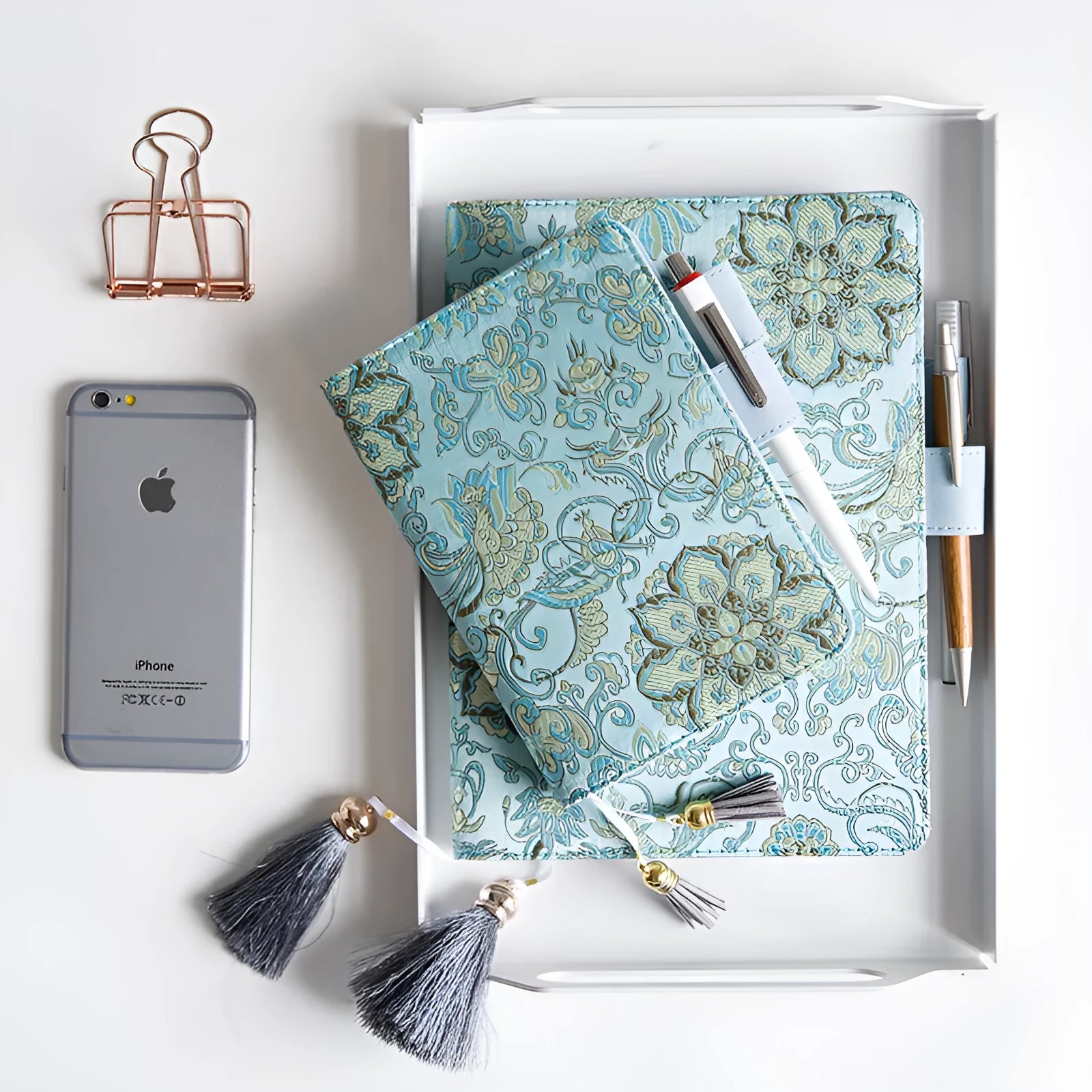 Blue floral fabric notebook open showing pages, available in A5 and A6 sizes.