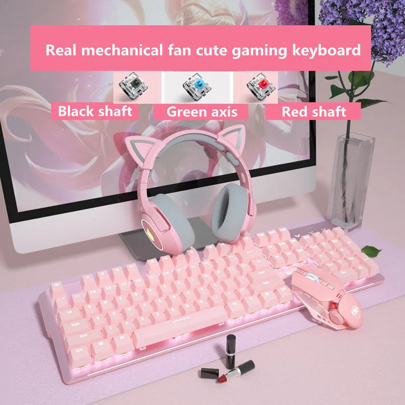 Pink wired mechanical keyboard and matching mouse set on a desk.