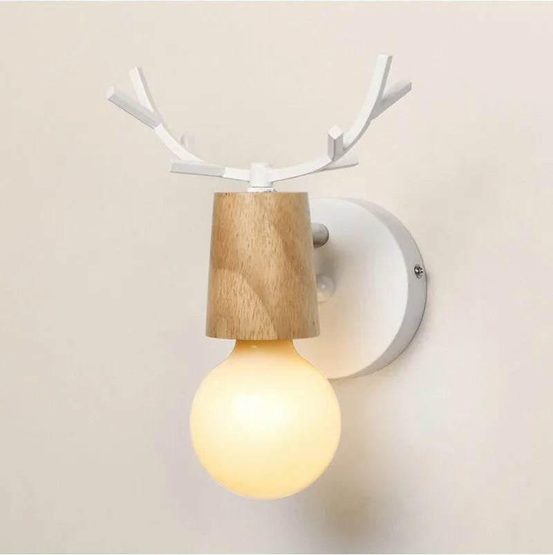 Wrought iron wall lamp with wood shade antler design 16 cm diameter 22 cm thickness E27