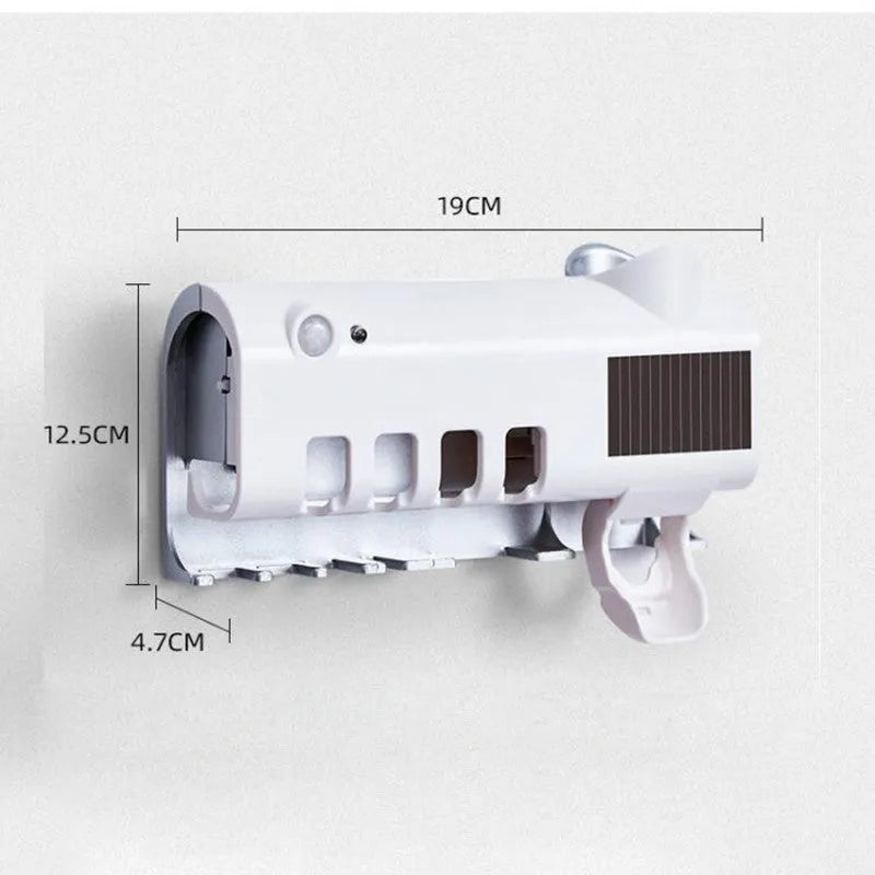 Intelligent UV toothbrush steriliser unit with automatic toothpaste squeezer mounted on wall