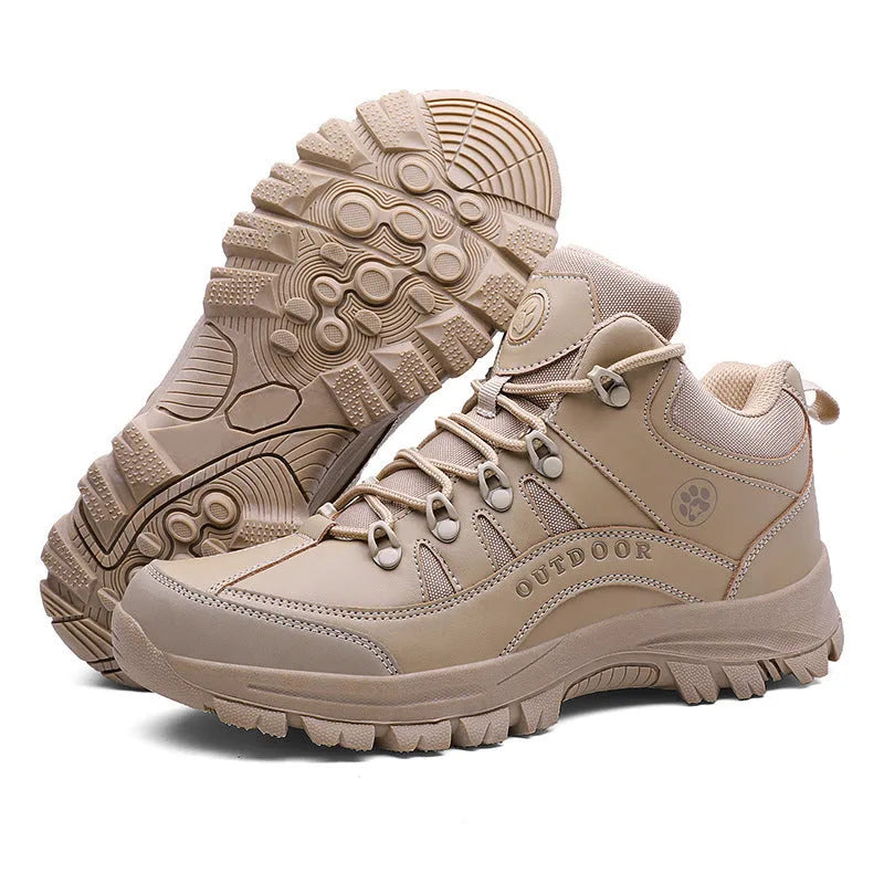 Men's military-style hiking boots in black with PU upper and rubber sole, shown on outdoor ground.