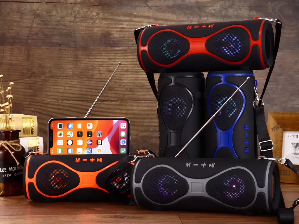 Black portable Bluetooth speaker with integrated mobile phone stand and control buttons