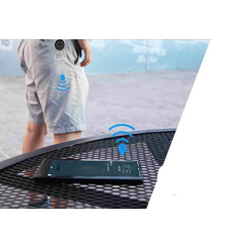 Black Bluetooth anti-lost tracker with keychain attachment and selfie remote function