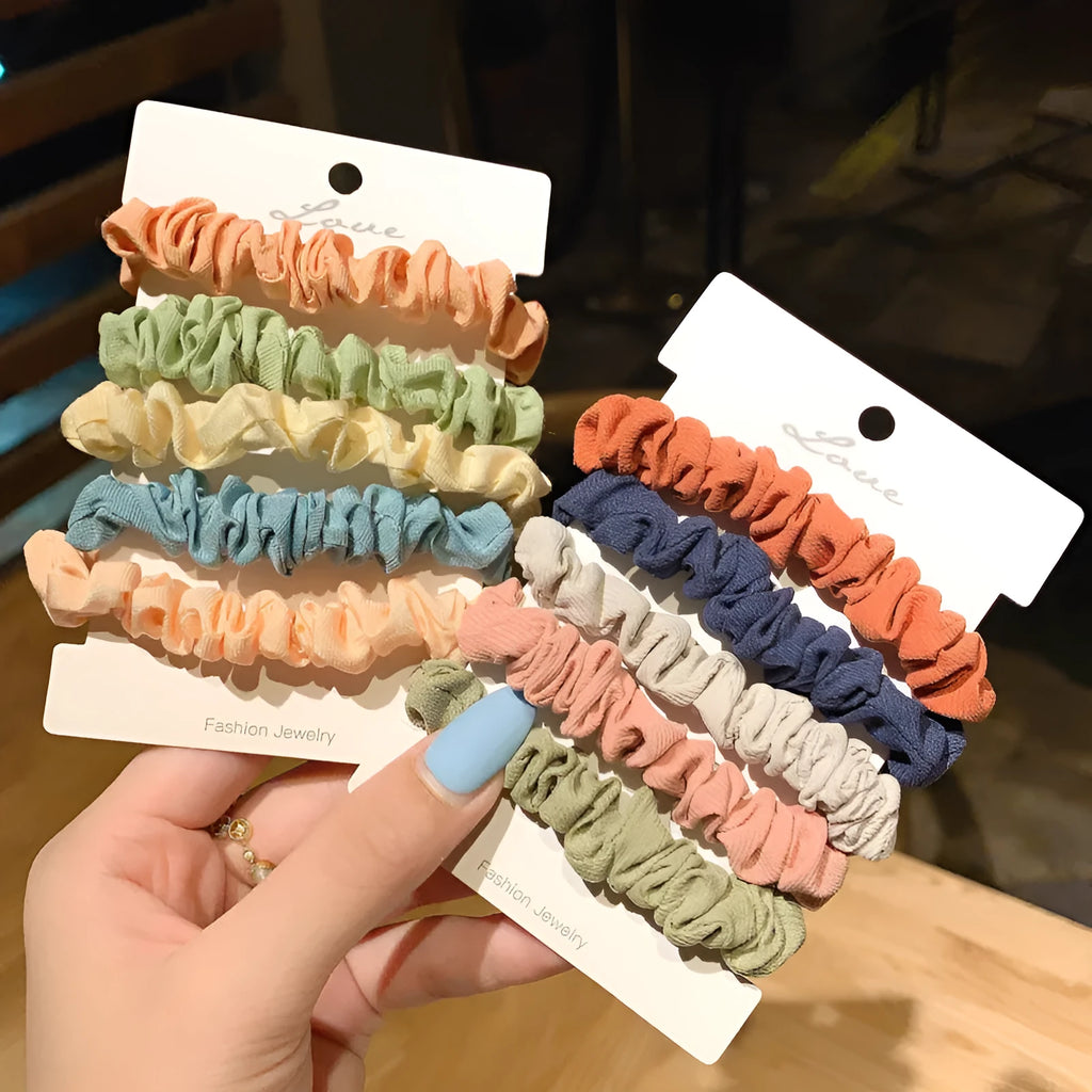 Set of children's hair rings and head ropes in autumn and macaron colours.
