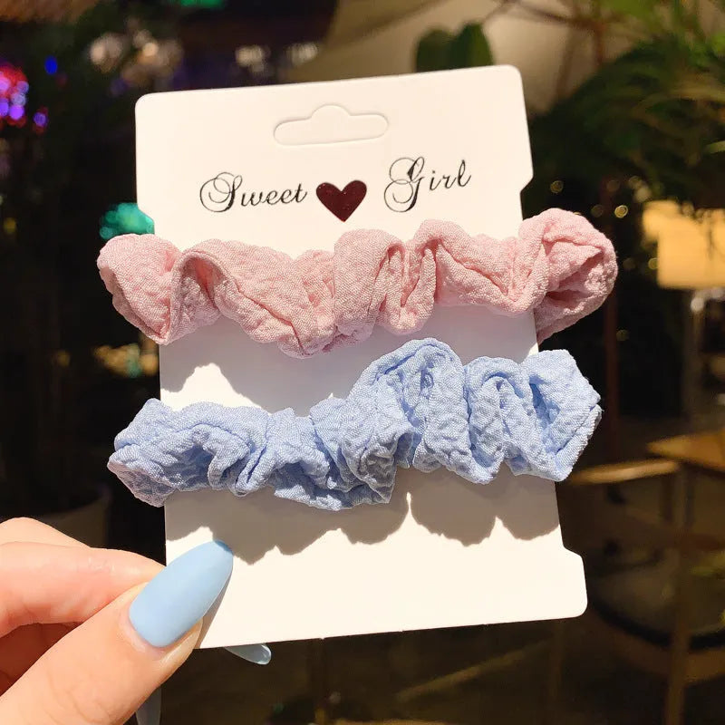 Set of children's hair rings and head ropes in autumn and macaron colours.