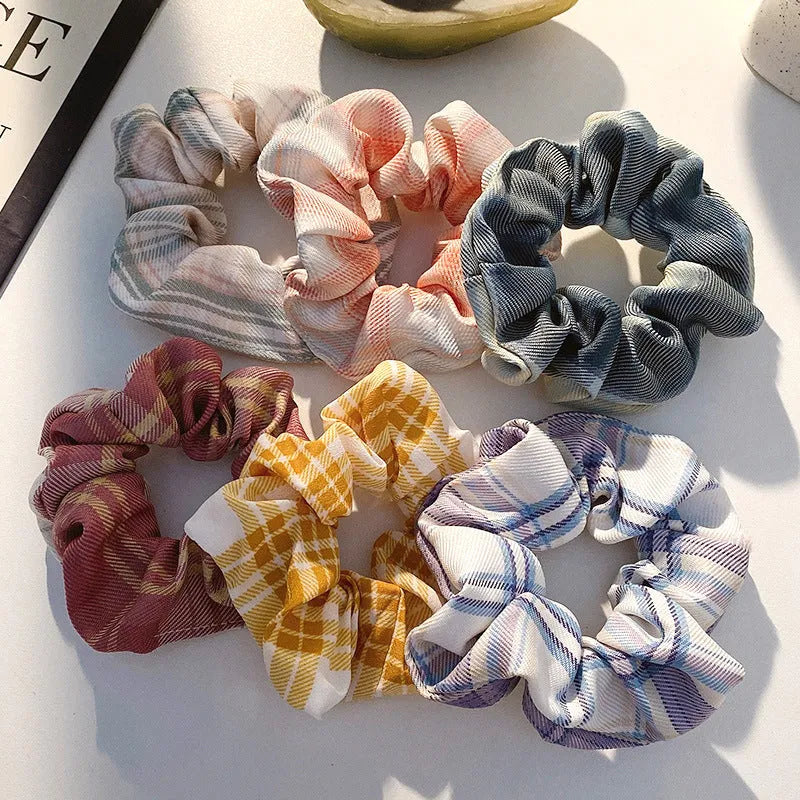 Set of children's hair rings and head ropes in autumn and macaron colours.