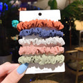 Set of children's hair rings and head ropes in autumn and macaron colours.