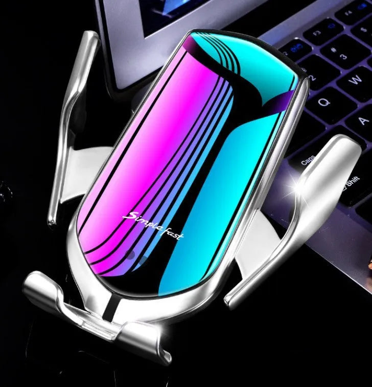 Magic Clip R1 automatic wireless charging car phone holder in gold on a dashboard.