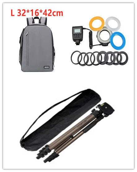 Black aluminium tripod extended to 1.3m with hydraulic head, mobile phone holder, and Bluetooth remote on a table.