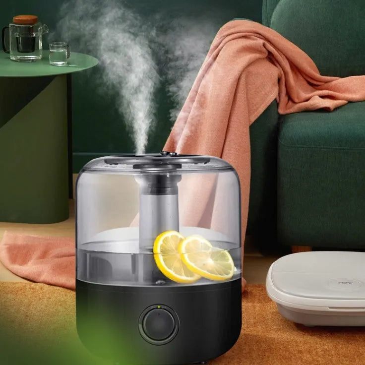 Black and white ultrasonic cool mist humidifier with 3-litre tank and mechanical controls.