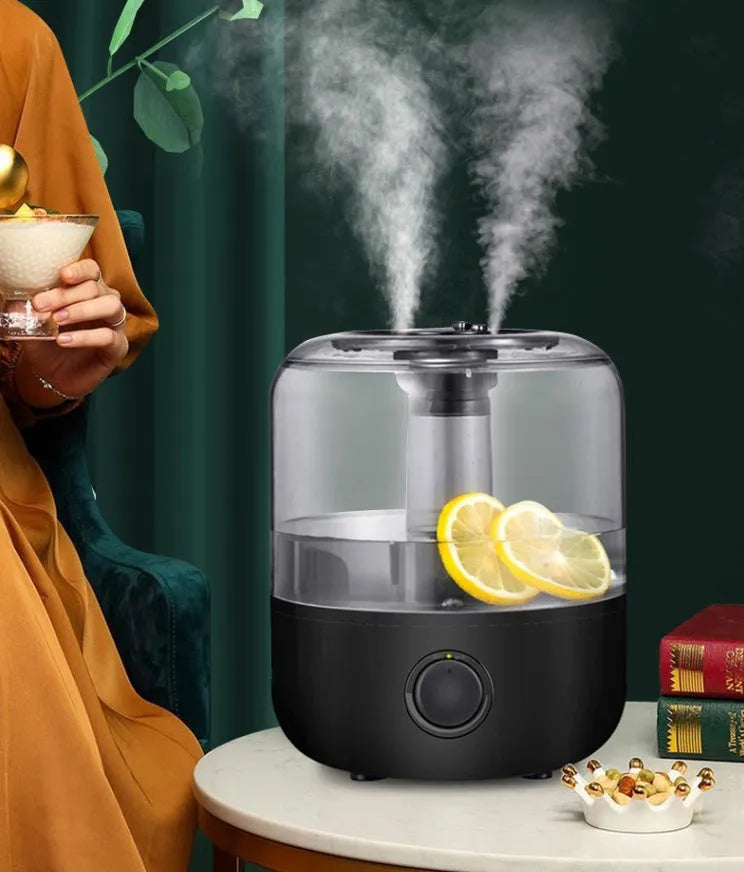 Black and white ultrasonic cool mist humidifier with 3-litre tank and mechanical controls.