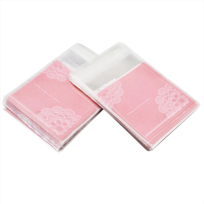 Pink self-adhesive plastic packaging bags with UV printing measuring 7x7cm for handmade soap packaging