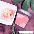 Pink self-adhesive plastic packaging bags with UV printing measuring 7x7cm for handmade soap packaging