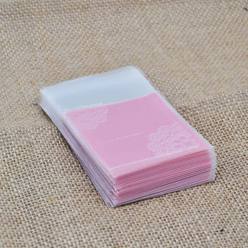 Pink self-adhesive plastic packaging bags with UV printing measuring 7x7cm for handmade soap packaging