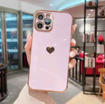 Electroplating love graphic TPU airbag protective case for iPhone on a white background.