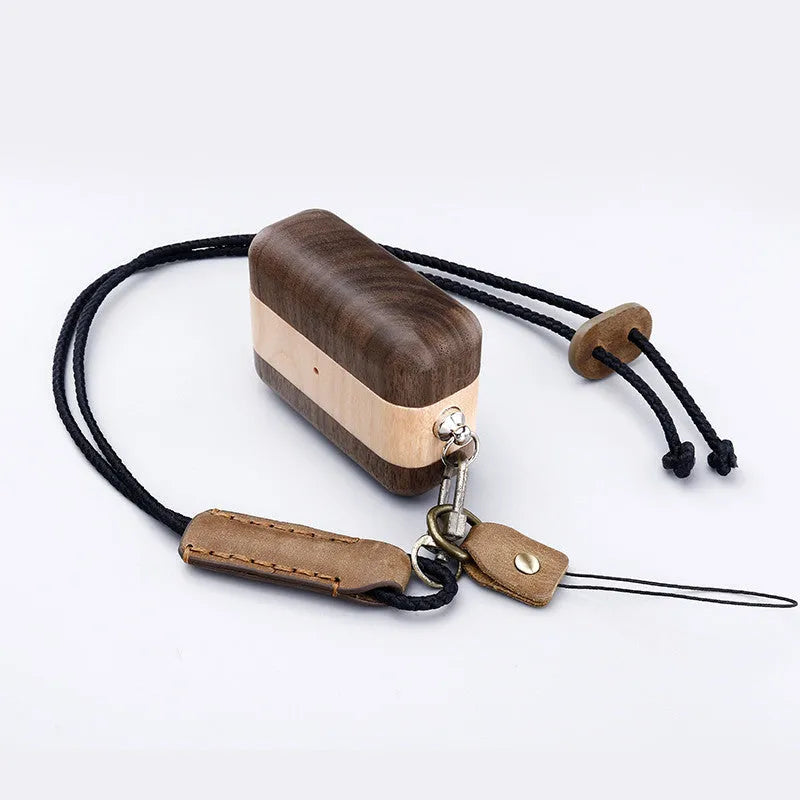 Solid wood Bluetooth earphone sleeve in choices of bamboo, cherry, maple, walnut, or huali wood.