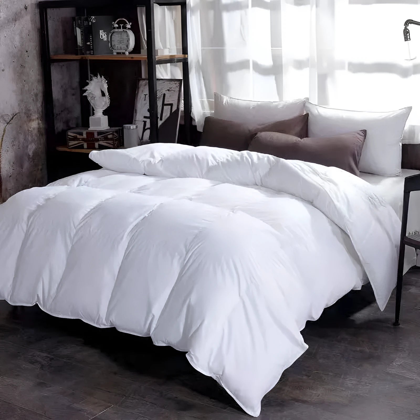 Goose down winter duvet with twill weave fabric in blue grey colour on bed
