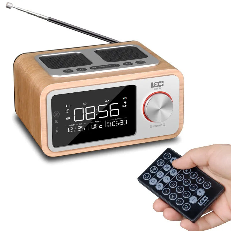 Compact wooden Bluetooth speaker alarm clock radio in golden oil colour on a desk