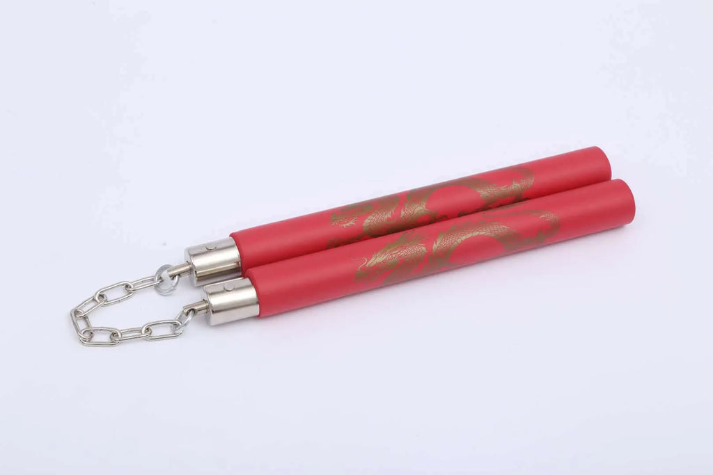 Red and blue sponge nunchakus with foam-covered sticks connected by a metal chain.