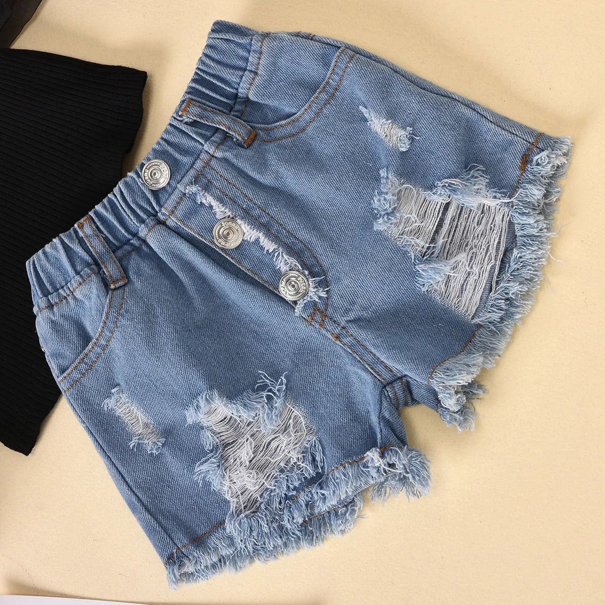 Children's striped cotton top with mesh sleeves and ripped denim shorts suit set.