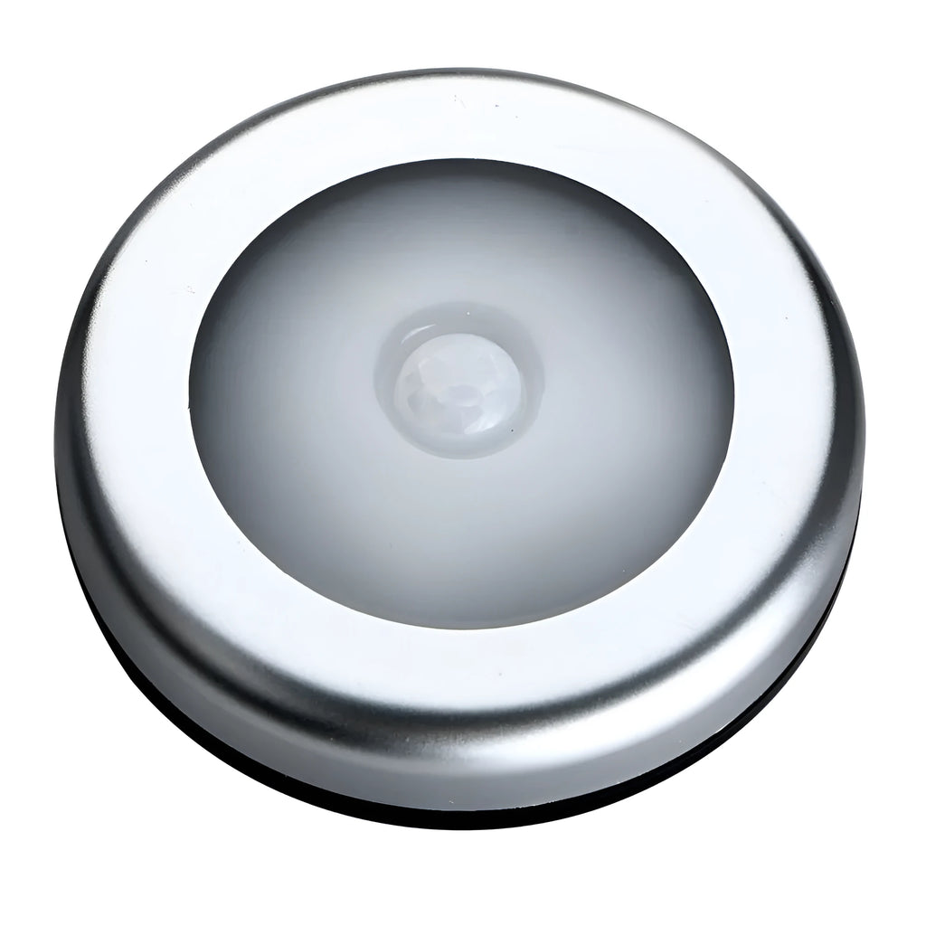 Silver wireless motion sensor night light showing compact 80mm design with LED illumination