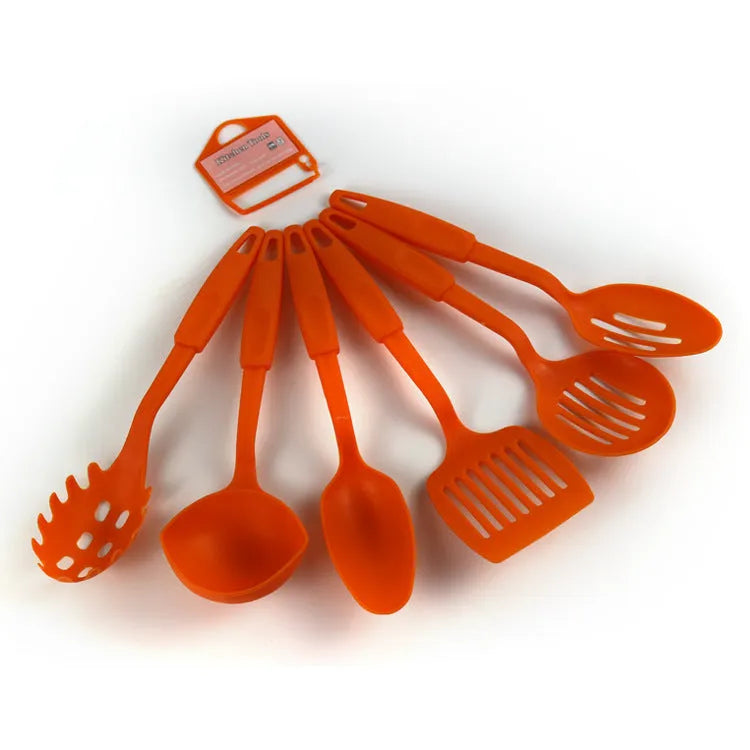 Black rubber and silicone kitchen utensil set with a solid spoon, slotted spoon, and spatula for non-stick pans.