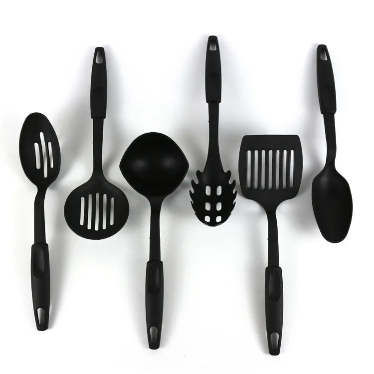 Black rubber and silicone kitchen utensil set with a solid spoon, slotted spoon, and spatula for non-stick pans.